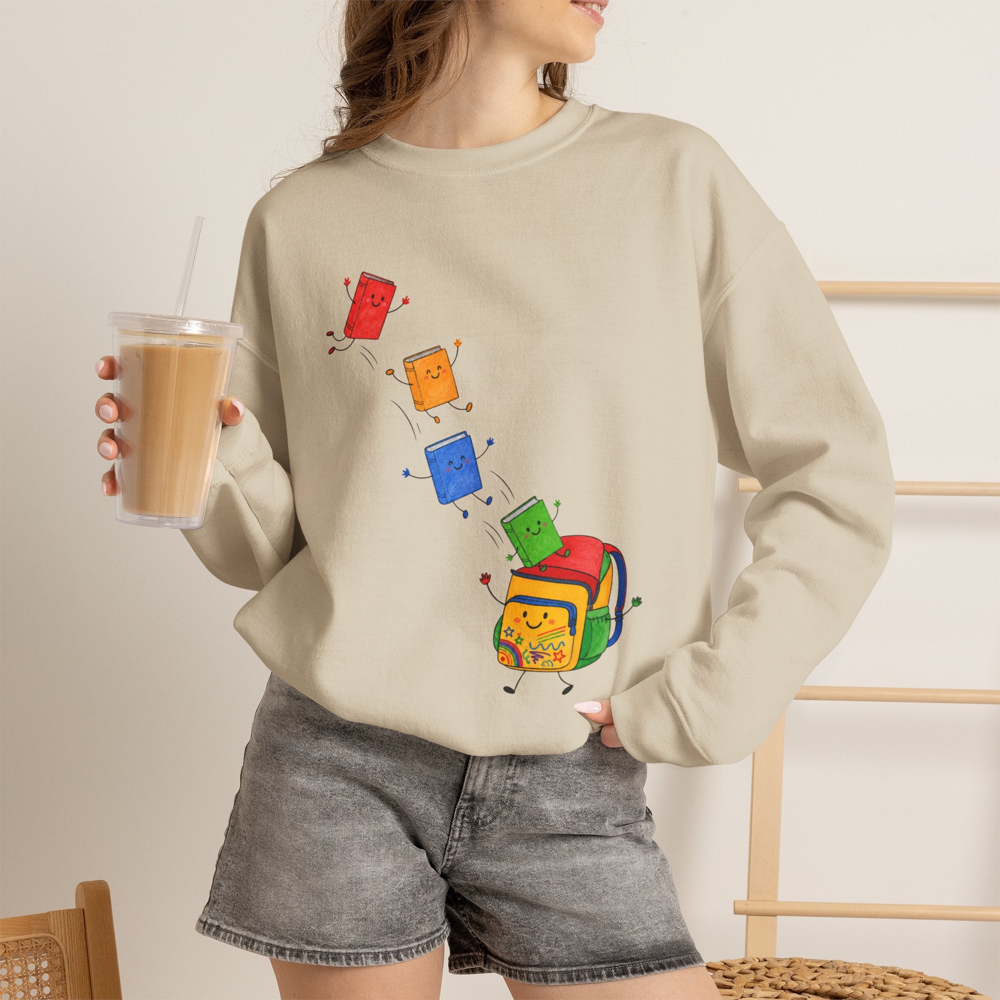 Teacher Backpack and Falling Books Crewneck Sweatshirt — Cute School Supplies Graphic