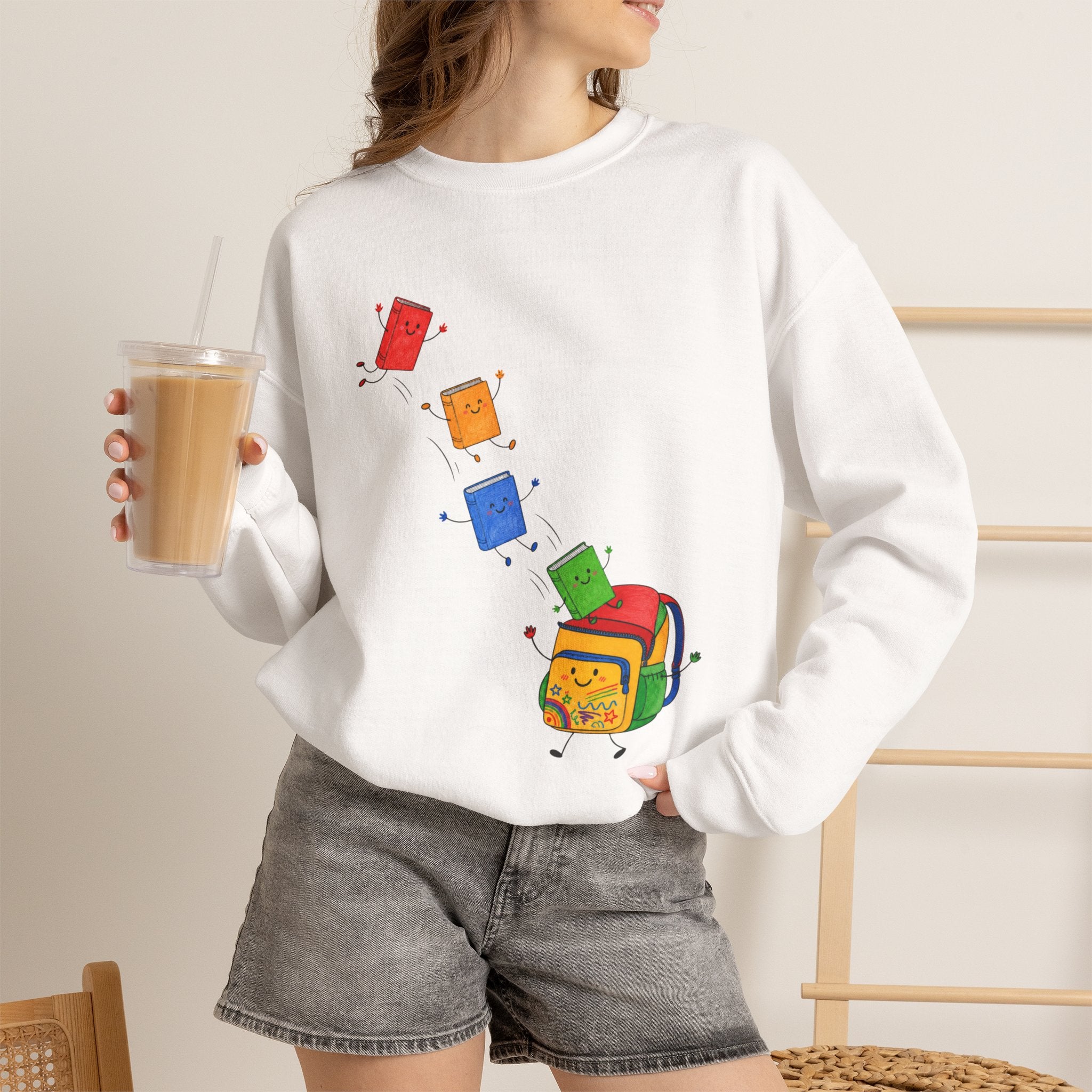 Teacher Backpack and Falling Books Crewneck Sweatshirt — Cute School Supplies Graphic