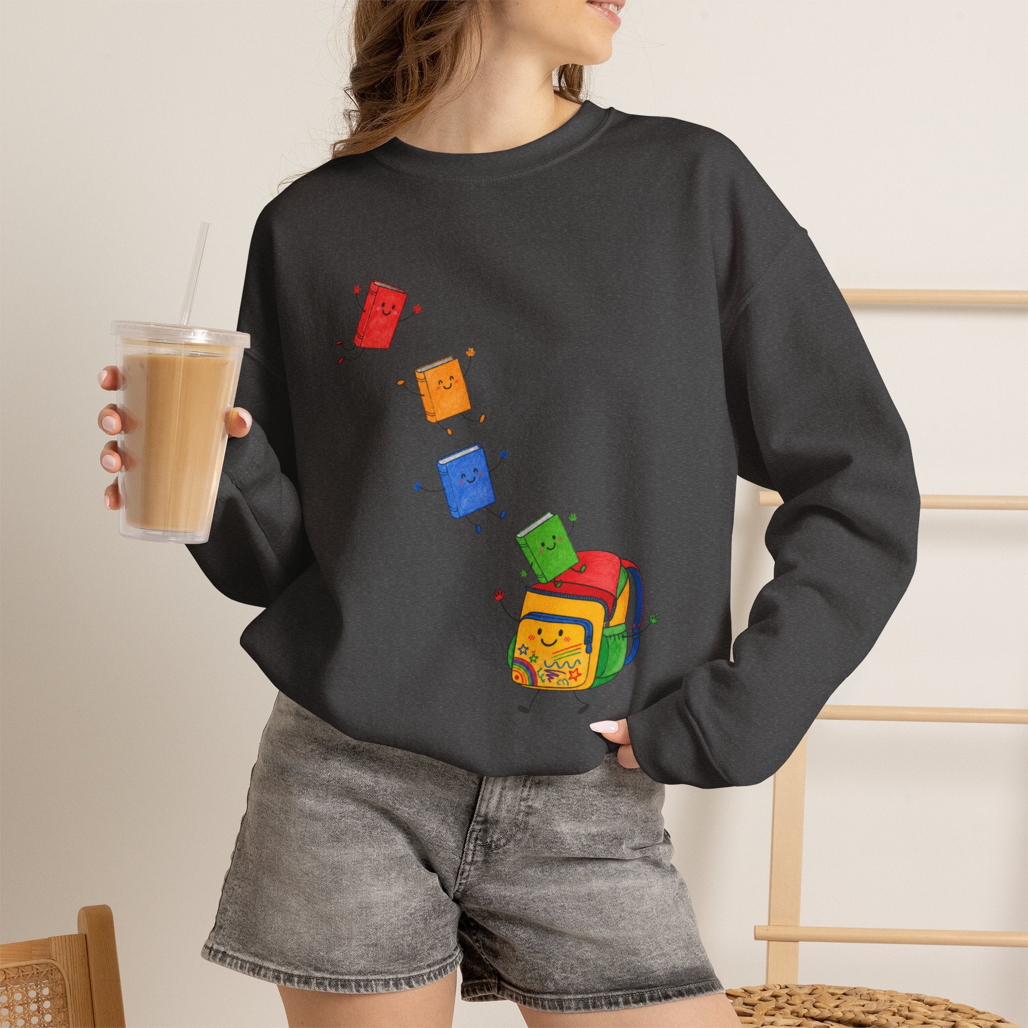 Teacher Backpack and Falling Books Crewneck Sweatshirt — Cute School Supplies Graphic