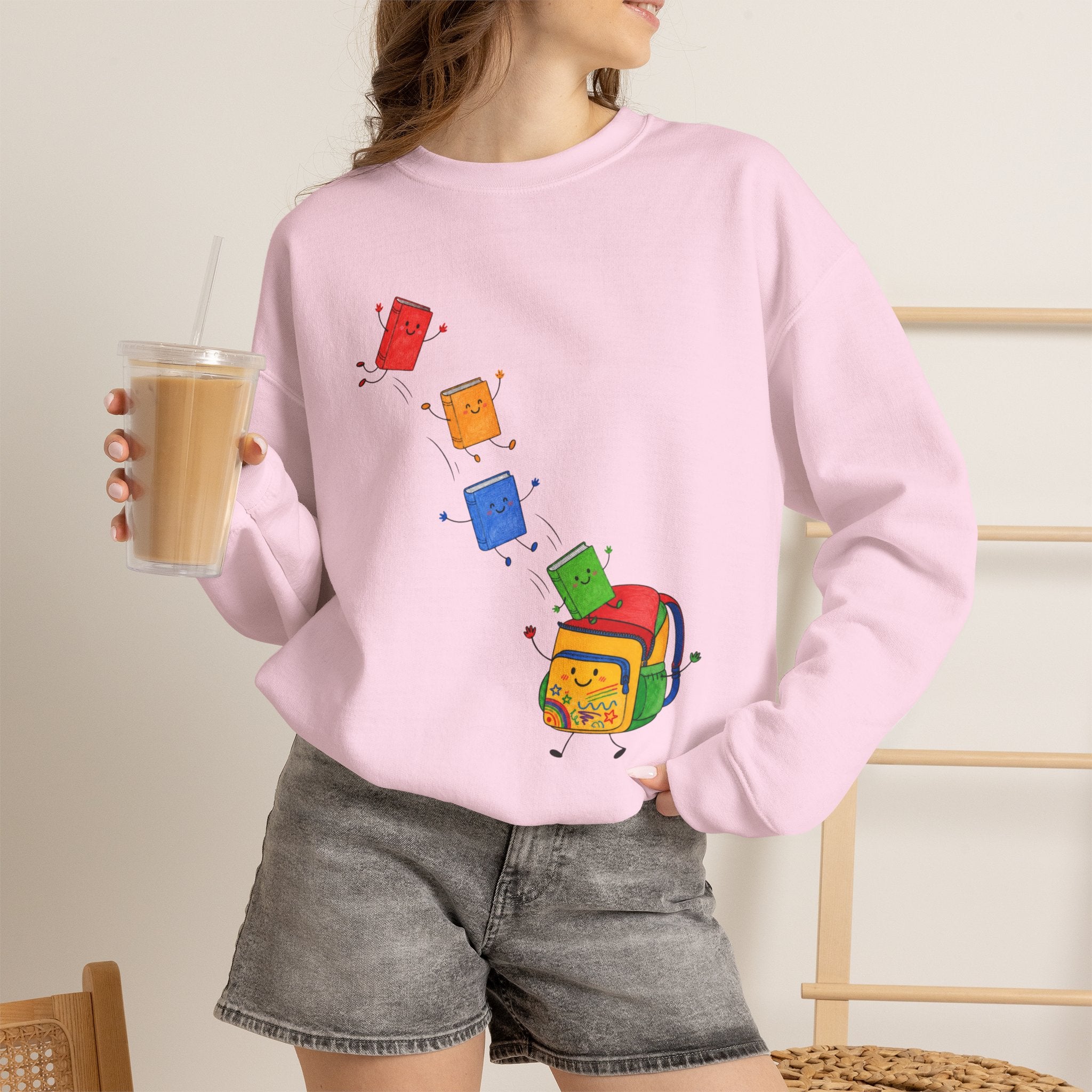 Teacher Backpack and Falling Books Crewneck Sweatshirt — Cute School Supplies Graphic