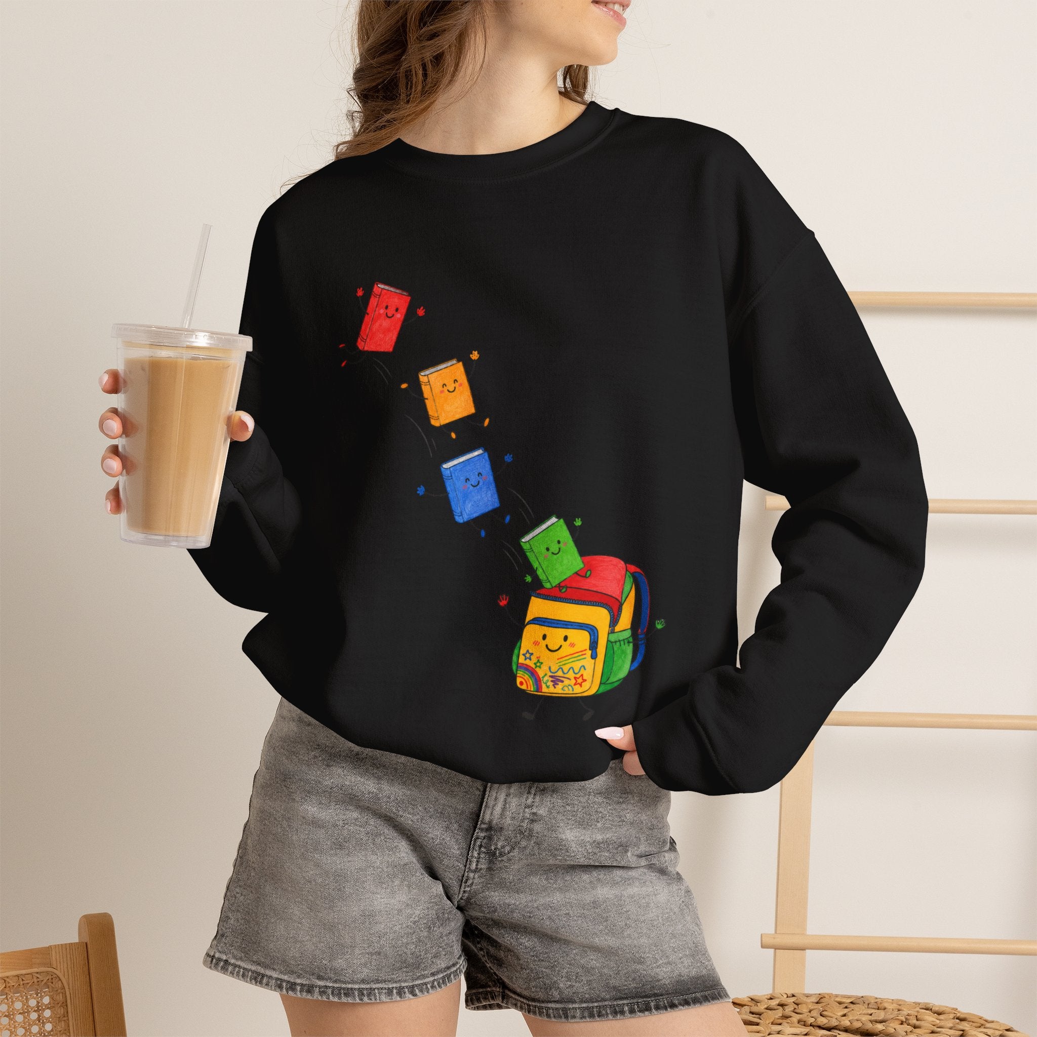 Teacher Backpack and Falling Books Crewneck Sweatshirt — Cute School Supplies Graphic